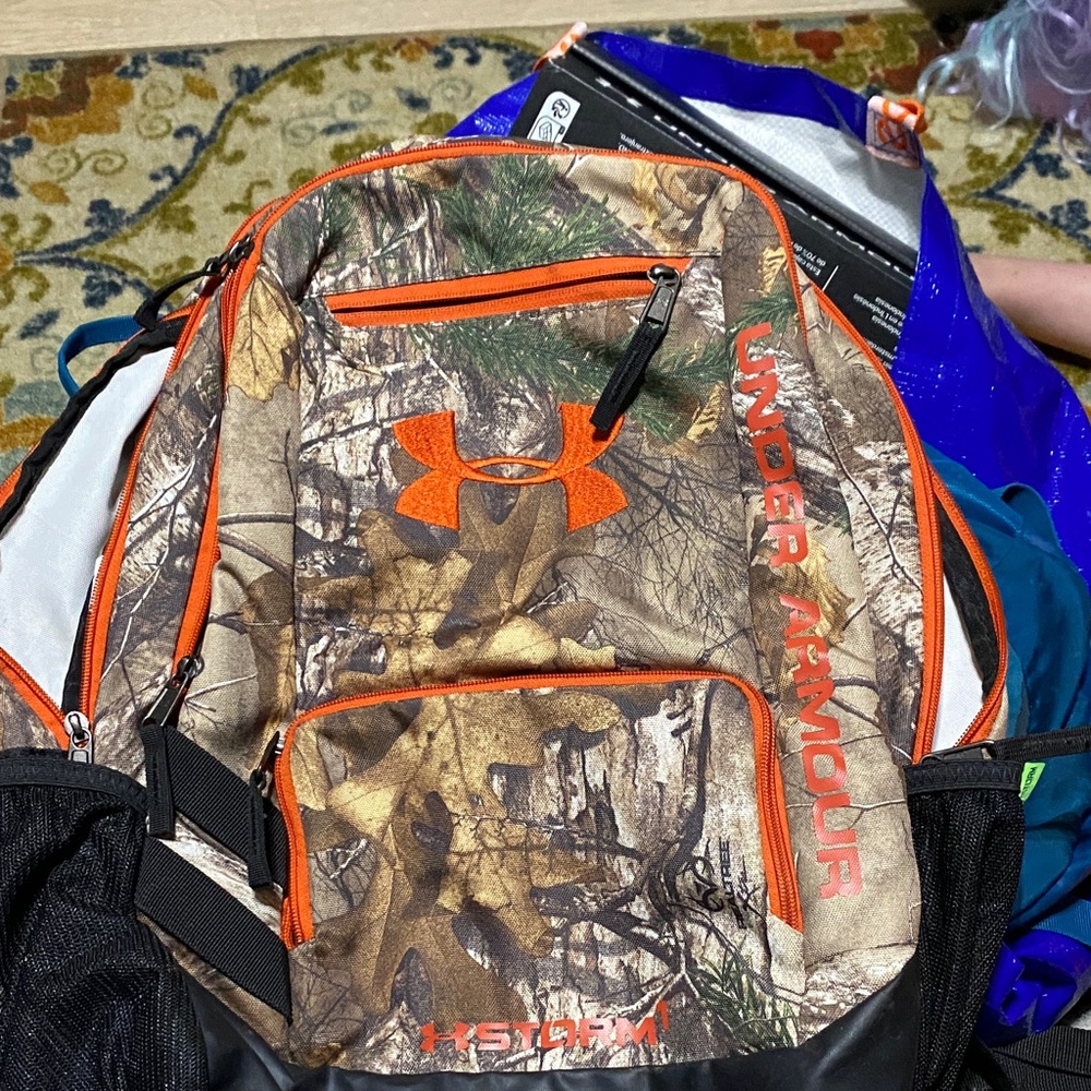 Under Armour Camouflage Backpack with Orange Highlights